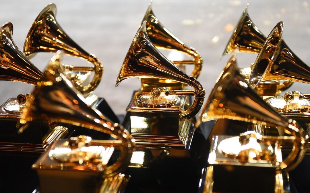 Picture of 6 golden Gramophone awards displayed